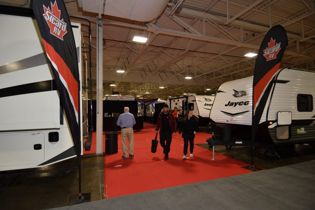 Sicard RV, one of the RV Business Top 50 Dealers in North America, displayed a range of Jayco travel trailers, fifth wheels, and motorhomes, as well as the Fleetwood Bounder and Pace Arrow, Leisure Travel Vans Unity, Winnebago Revel and Solis.