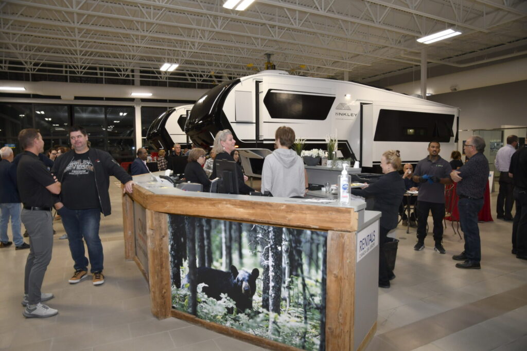 Owasco RV customers enjoy a VIP introduction of the new Brinkley RV fifth wheels.