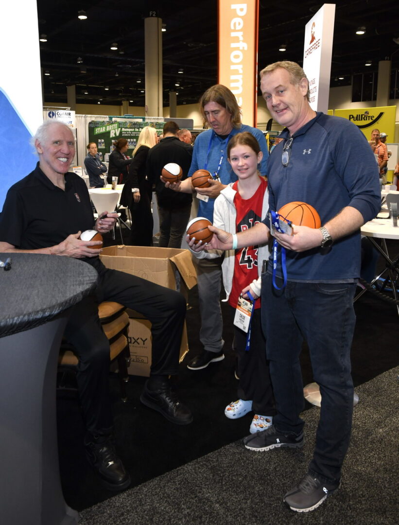 NBA Hall of Famer Bill Wilton chatted with Expo attendees and signed basketballs at the NTP-Stag SeaWide Expo.