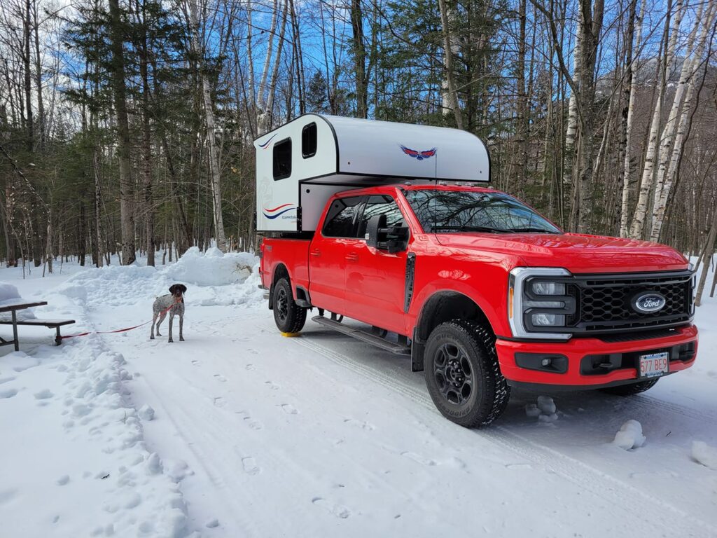 Soaring Eagle truck camper in a winter camping environment
