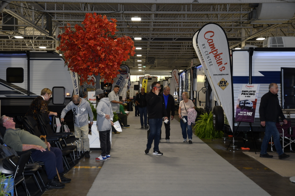 RV enthusiasts strolling through the ORVDA Fall RV Show.