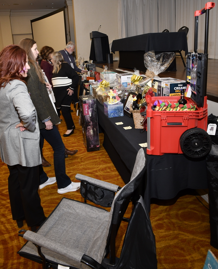 Auction items on display during the CampEx conference dinner at the Marriott On The Falls, in Niagara Falls, Ontario.