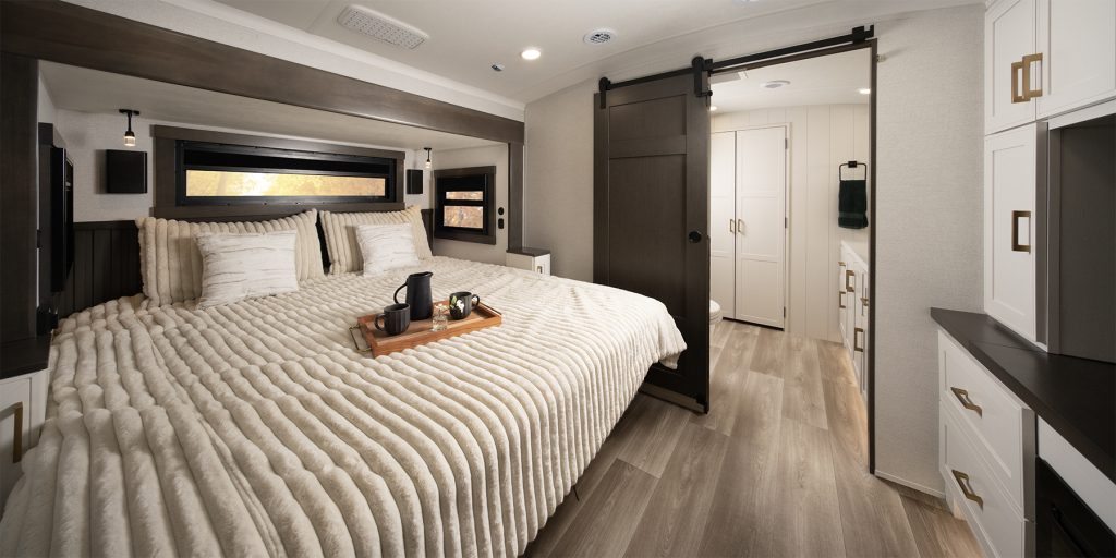 2027 DRV Mobile Suites fifth wheel trailer - master bedroom.