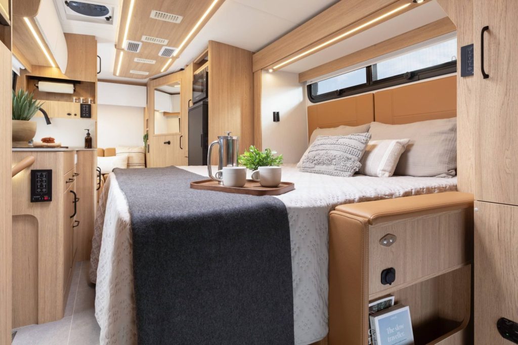 2027 Leisure Travel Vans Wonder FX - has a nearly king-size 65-inch by 74-inch Murphy bed lowers over the Leisure Lounge