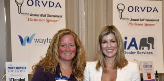 Natalie Conway, right, presents the 2023 ORVDA Associate Member of the Year to Amy Bradley.