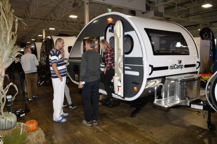 Toronto Fall RV Show visitors check out the nuCamp trailers at the Platinum RV display.