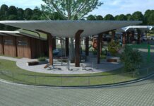 THOR EV RV Charging station concept - Amenities, including restrooms, a playground and fitness equipment, help eRV owners relax and recharge alongside their vehicles. These facilities, like the entire concept charging station, are designed to blend into their natural surroundings.