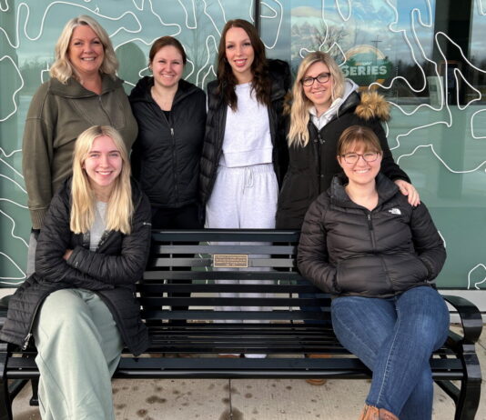 RuthAnn, Samantha, Danielle, Trisha, Jadyn and Georgia Goodrick celebrate the dedication of the George Goodrick bench at the RBC Centre, Dartmouth, Nova Scotia.