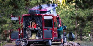 A family enjoys a camping adventure in their Winnebago class B motorhome.