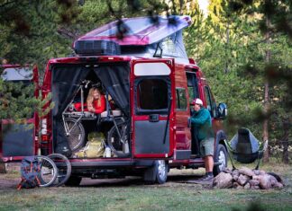 A family enjoys a camping adventure in their Winnebago class B motorhome.