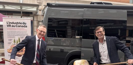 The Honourable Brendan Hanley, MP for Yukon, joins Jeff Redmond of RVDA of Canada toast a symbolic marshmallow during RV Industry Advocacy Day on Parliament Hill, Ottawa.