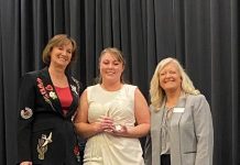 RVWA Finalists for Industry Champions Awards Susan Carpenter, left, and Tracy Anglemeyer, far right, present the 2025 RVWA Champion of Women Award to Brandy Droptiny, Customer Service Manager at Winnebago Towables