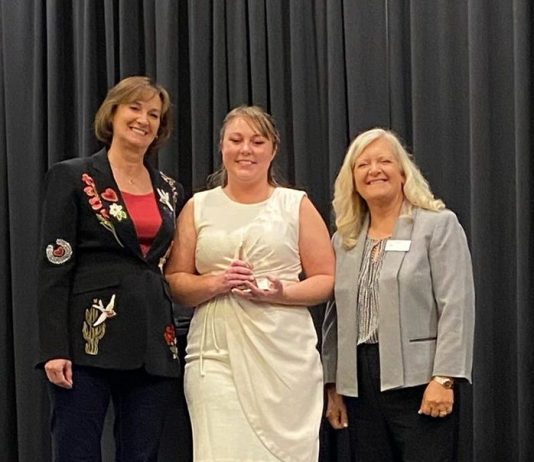 RVWA Finalists for Industry Champions Awards Susan Carpenter, left, and Tracy Anglemeyer, far right, present the 2025 RVWA Champion of Women Award to Brandy Droptiny, Customer Service Manager at Winnebago Towables